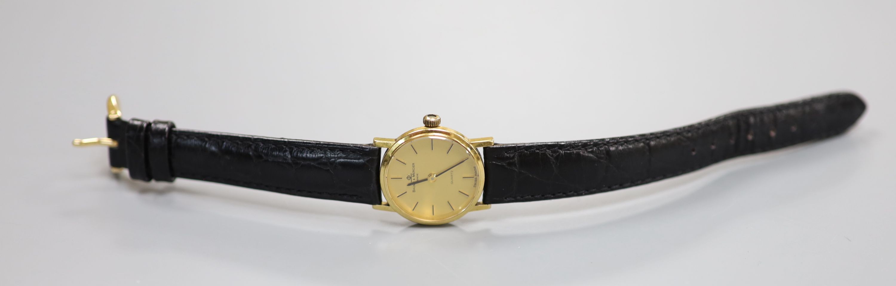 A lady's 18ct Baume & Mercier quartz wrist watch, on associated leather strap, in Baume & Mercier box